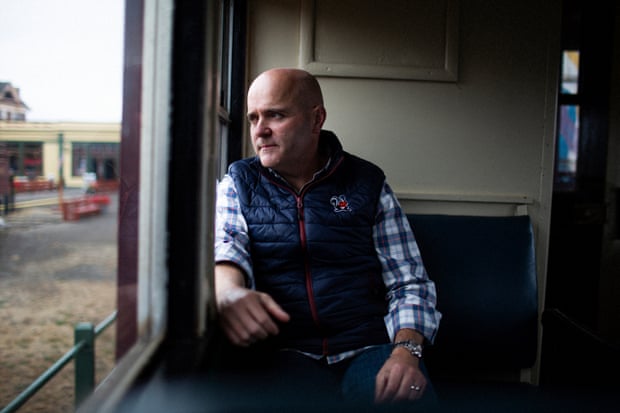 Robert Jason Pinoli, the ‘Chief Skunk’, aboard the train. ‘These are my friends and neighbors dealing with shortages,’ he says. Photograph: Talia Herman/The Guardian
